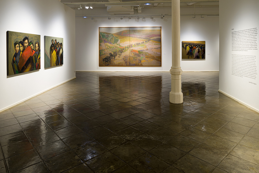 Art gallery featuring Guerrero Medina's paintings, with group portraits on the left and a large landscape painting in the center.