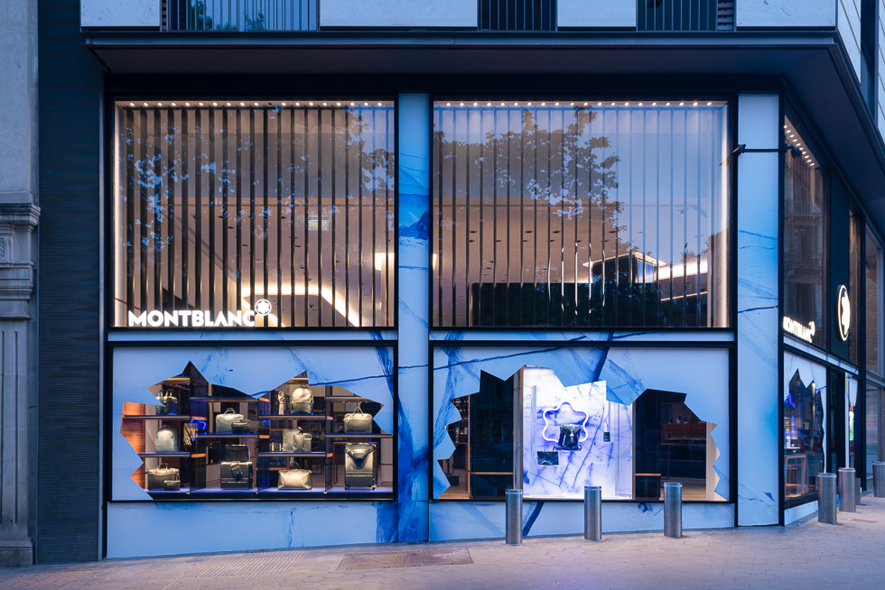 Montblanc store facade featuring glacier-themed design elements and illuminated window displays.