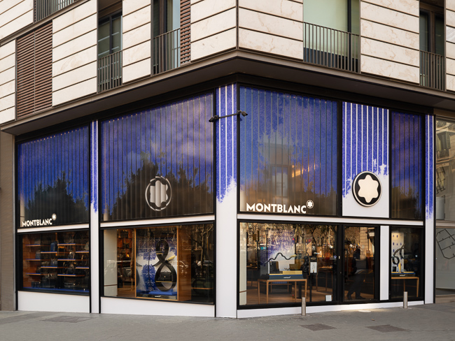 Montblanc store exterior with a modern design, featuring large windows and elegant branding.